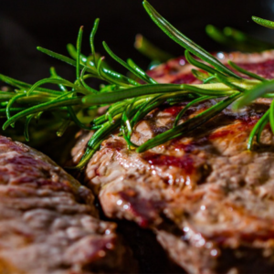 Paleo Diet: Steak garnished with rosemary